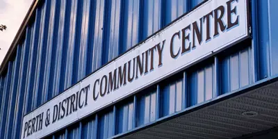 Close of sign that reads Perth and District Community Centre