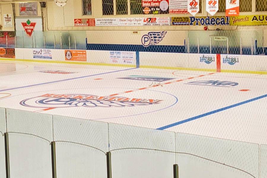 View of indoor ice arena looking towards Centre ice