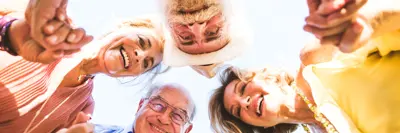 Group of seniors holding hands